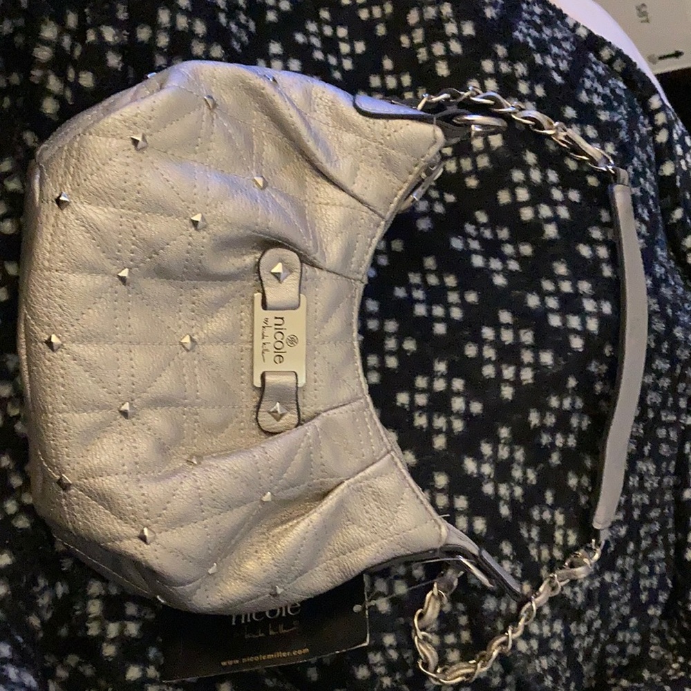 Brand New w/tag. Silver Nicole Miller mini handbag